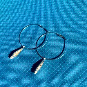 Beautiful hoop earrings asking $10.00 a piece..